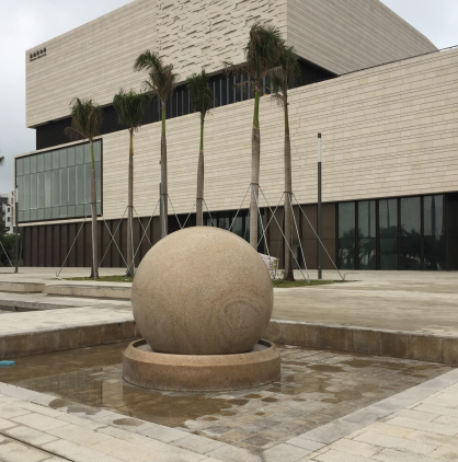 Xingyan Stone Eskulturak Zhuhai-ko Txinako Mainlandiako Feng Shui Ball handiena sortzen du